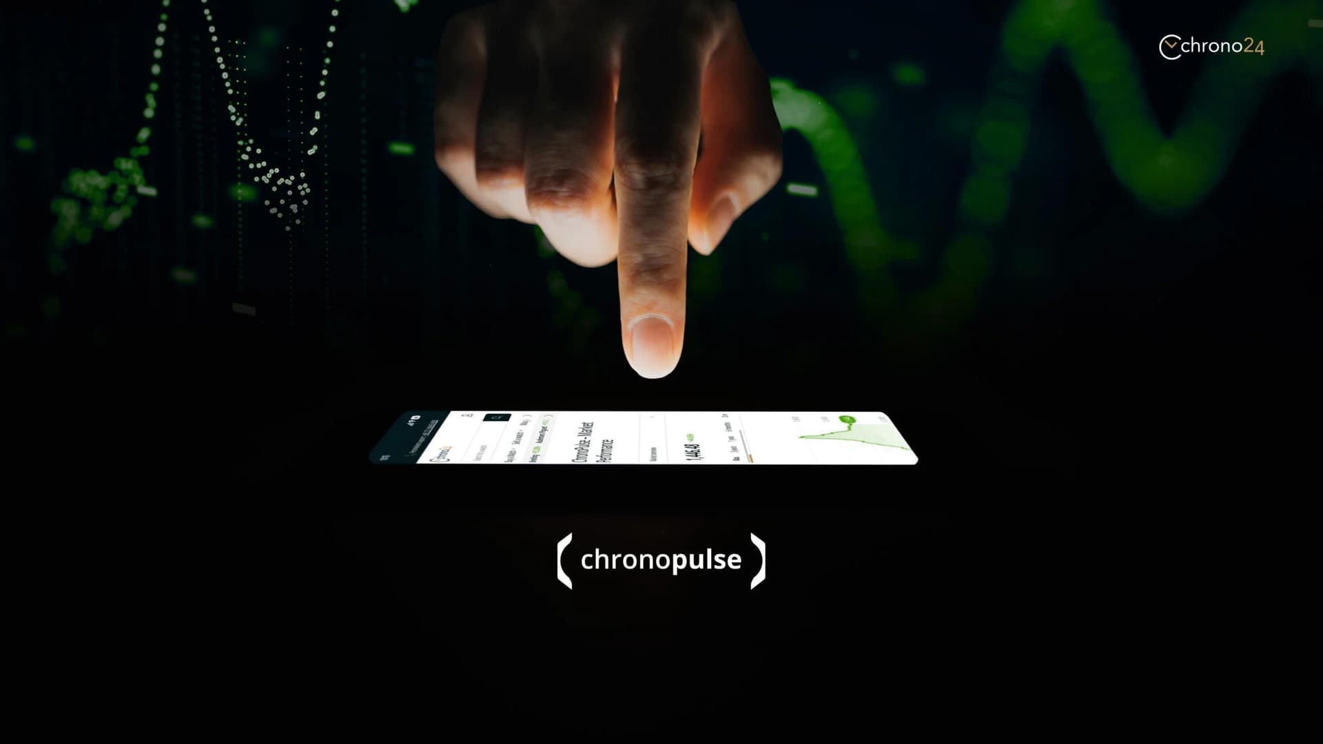 finger hovering above a phone with the Chrono24 app open in a dark room