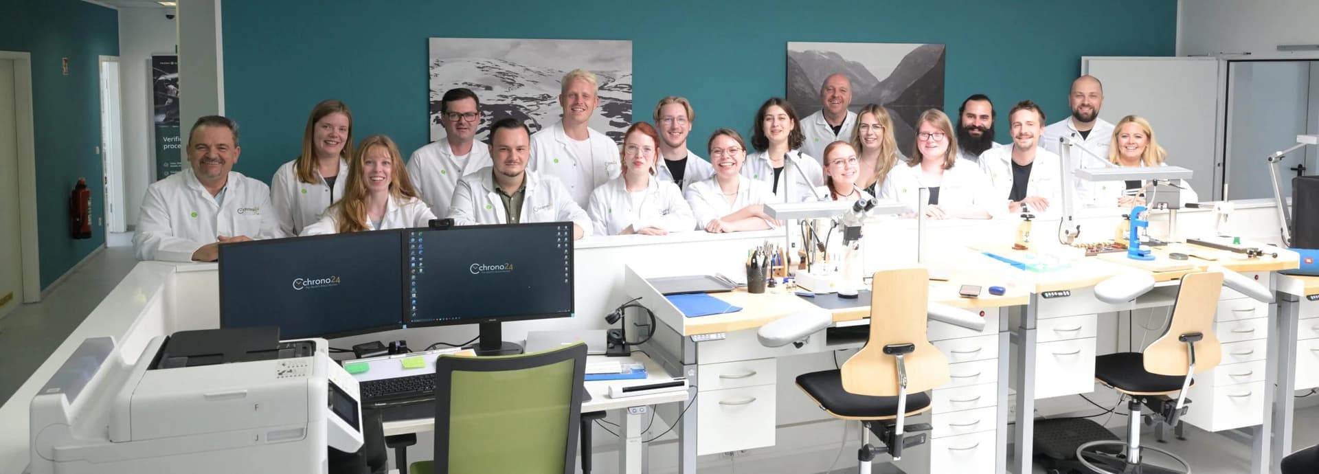 Chrono24 Direct team posing in front of office