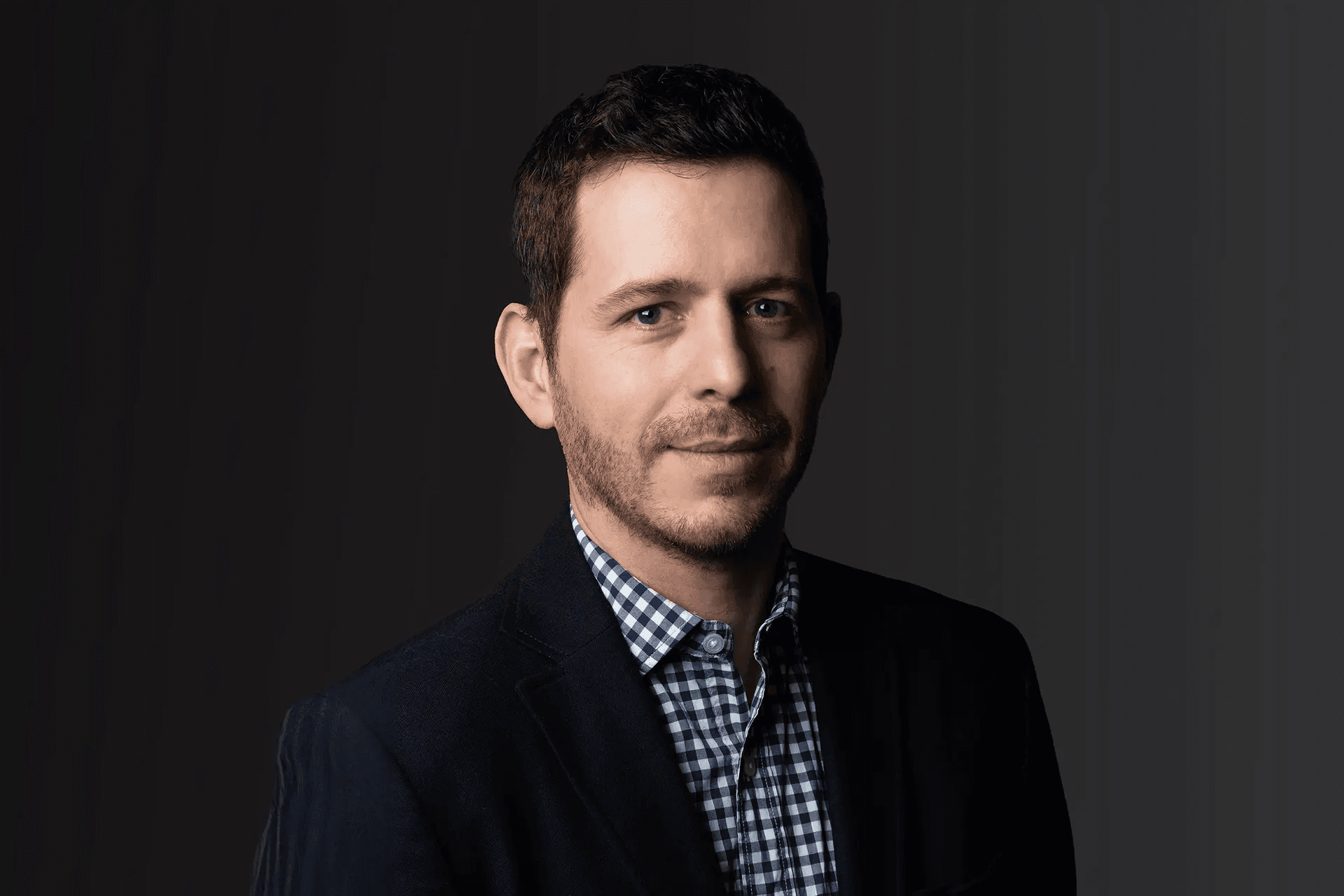 Portrait of Jose Gaztelu with a black background